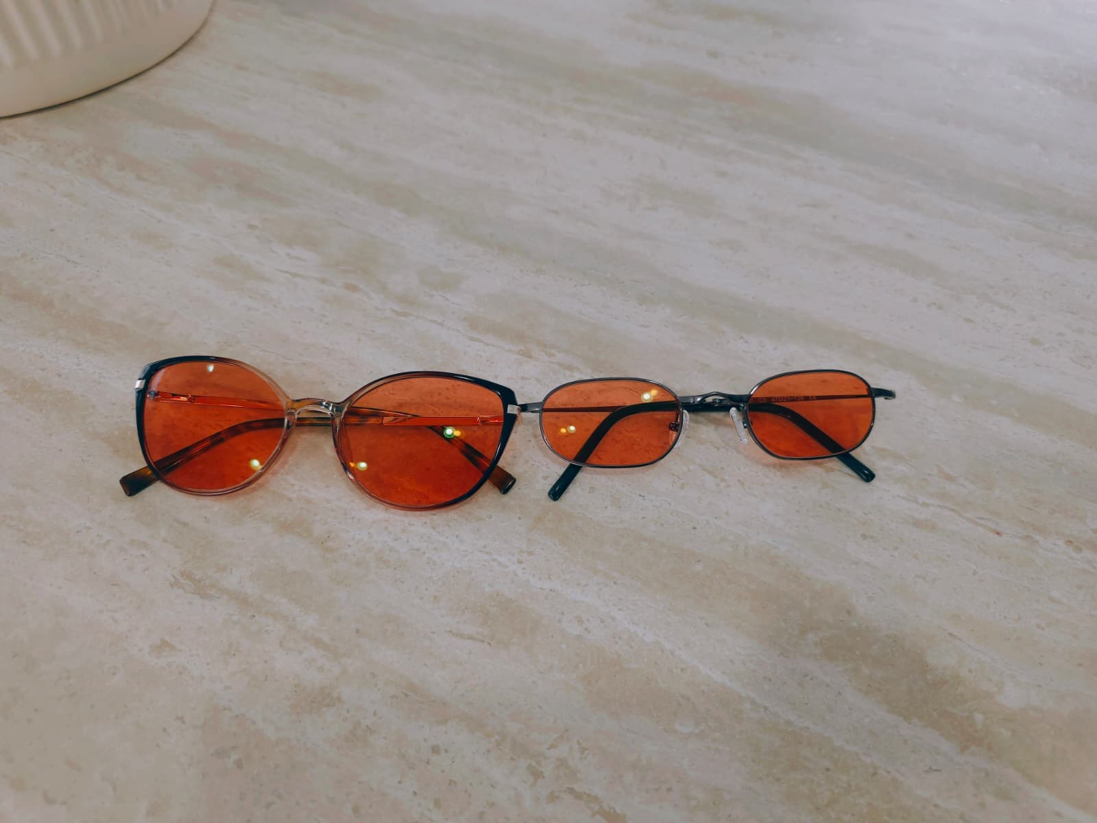 Woman with light sensitivity and migraine seeking migraine glasses in Australia